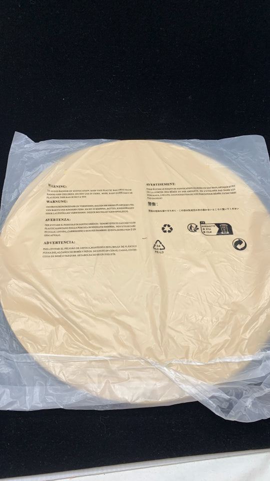 NIP 6PC CREAM COLORED LEATHER-BACKED PLACEMATS.