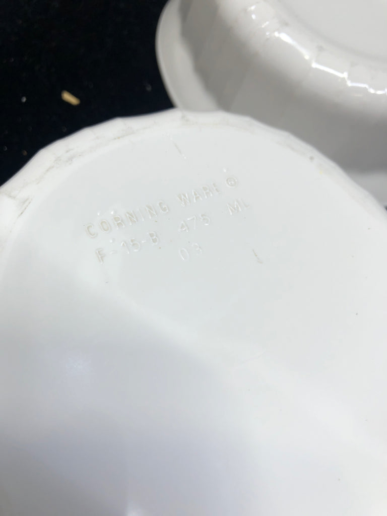 2 WHITE OVAL CORNING WARE BAKING DISHES.