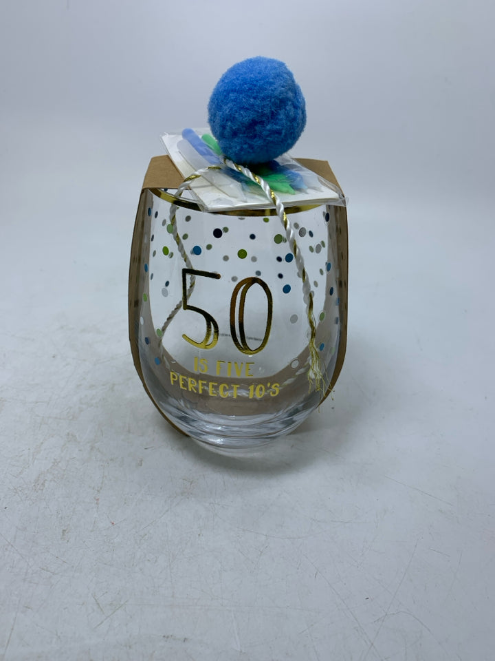 NIP 50 IS FIVE PERFECT 10'S STEMLESS POLKA DOT WINE GLASS.