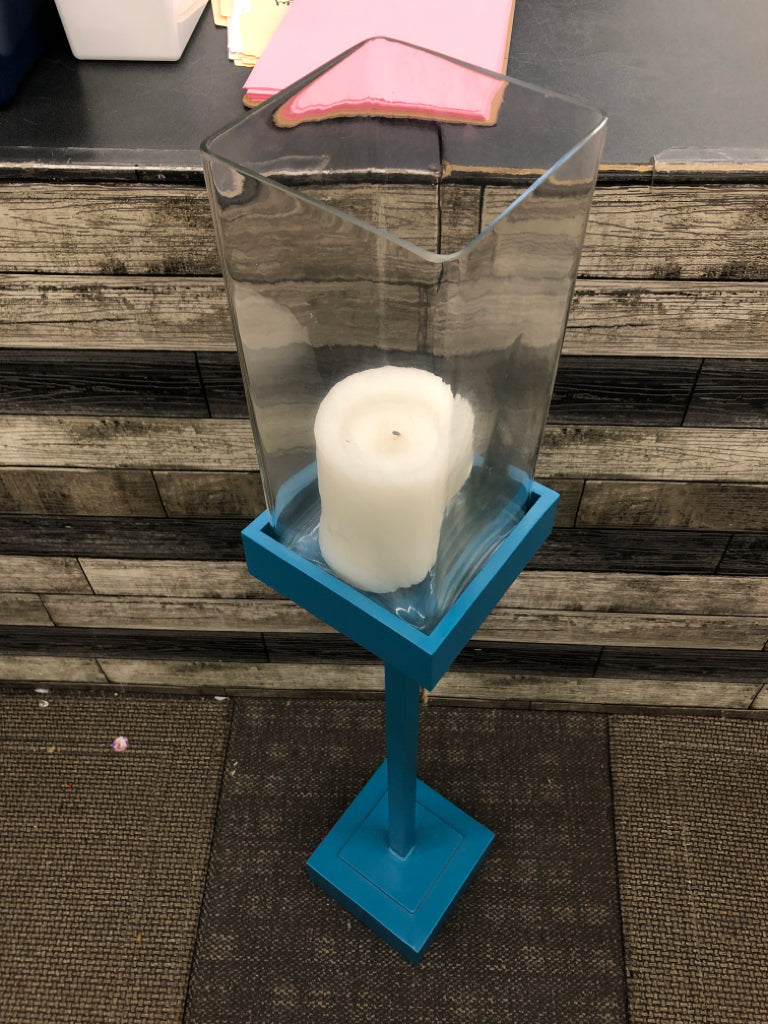 MEDIUM BLUE SQUARE BASE CANDLE HOLDER W/CLEAR GLASS TOP.