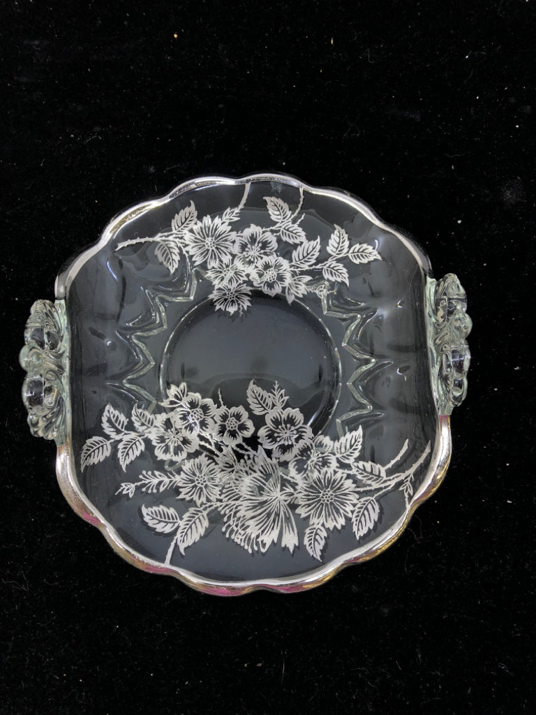 VTG CLEAR PRESSED GLASS WITH SILVER FLORAL PATTERN.