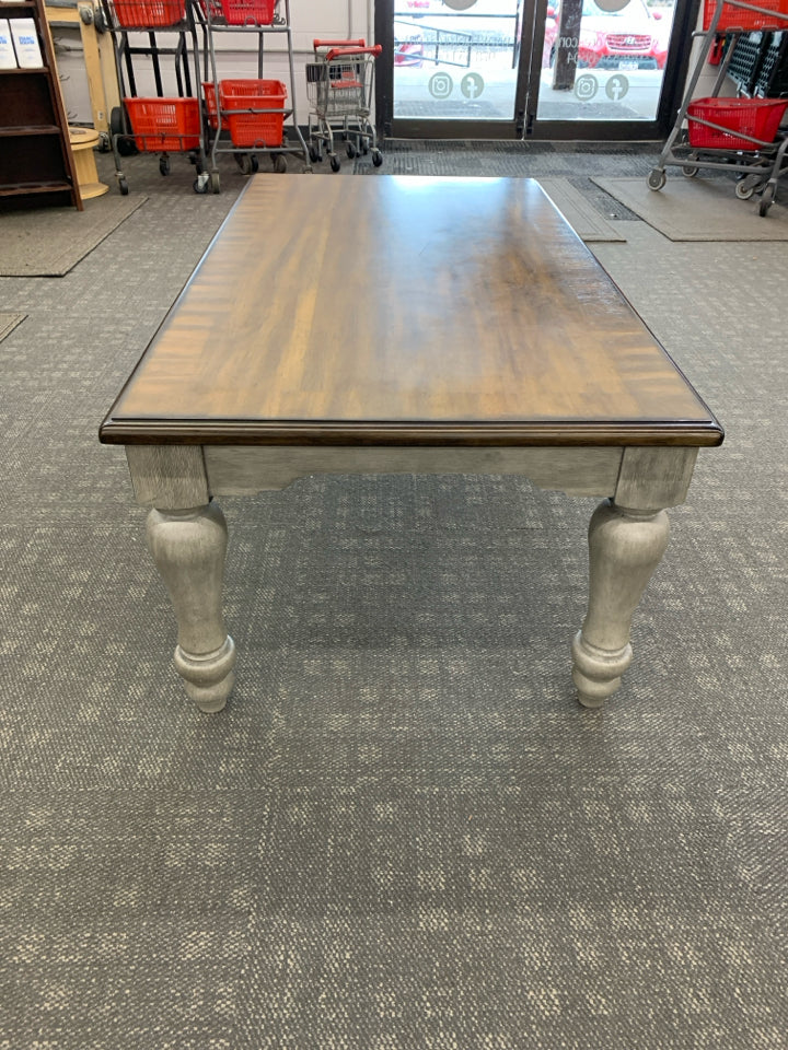 DARK WOOD TOP W GREY DISTRESSED LEGS COFFEE TABLE.