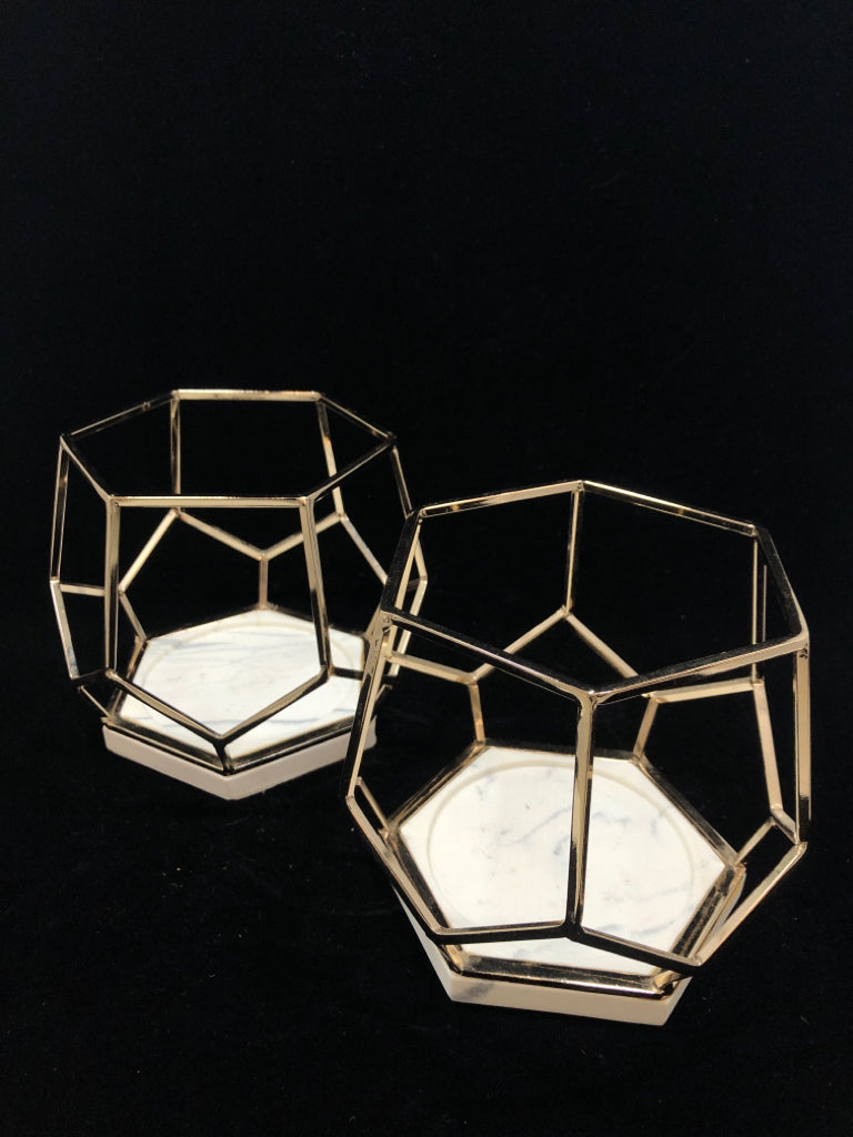 2 LG GOLD GEOMETRIC CANDLE HOLDERS.