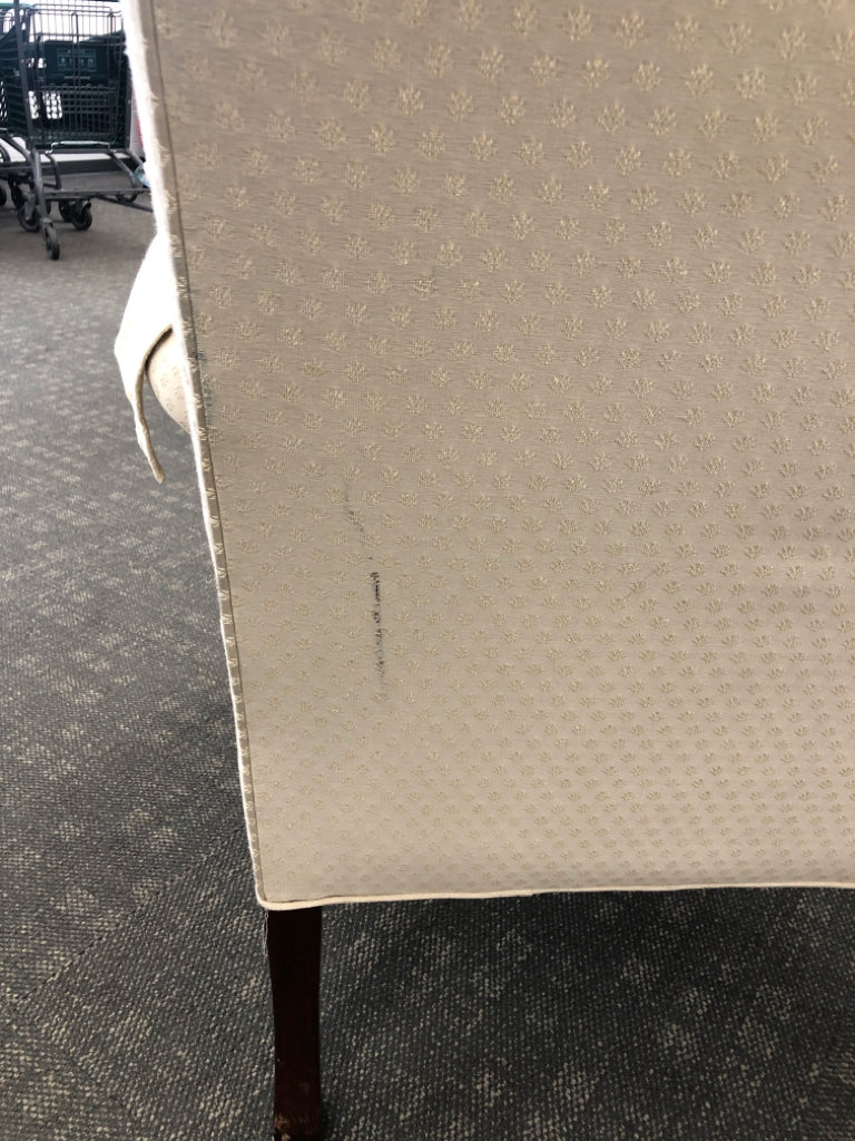 VTG CREAM WING-BACK CHAIR.