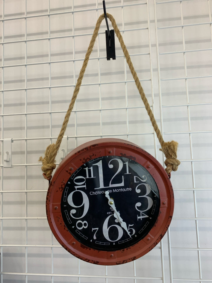 RED METAL INDUSTRIAL HANGING CLOCK.