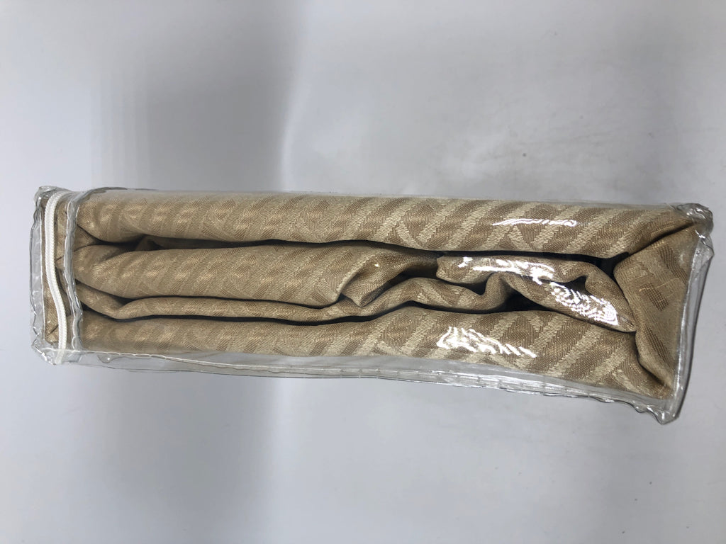 NIP BEIGE BEDSPREAD.