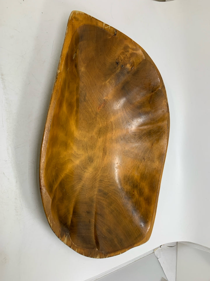 OVAL GLAZED CRAVED WOOD BOWL W/ POINTED EDGE.