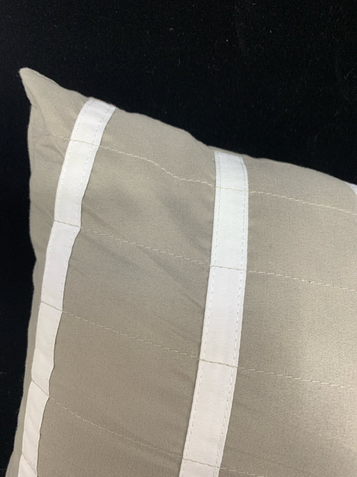 SKINNY GREY PILLOW W/ WHITE STRIPES.
