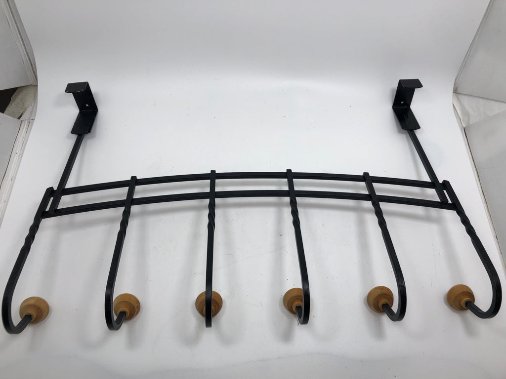 BLACK METAL AND WOOD OVER DOOR COAT HOOK.