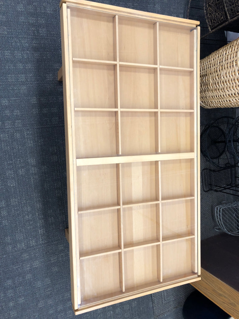 WOOD COFFEE TABLE W/ 18 SLIDE-OUT SLOTS & GLASS COVER.