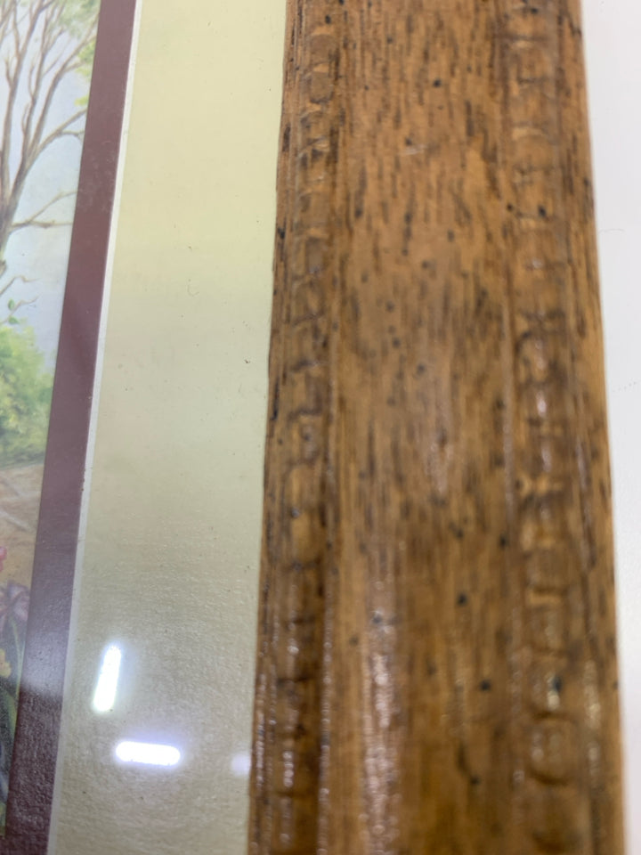 CAROUSEL SHOP PRINT IN BROWN FRAME.