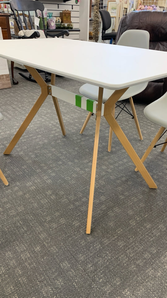 4 CHAIRS + WOOD TABLE W/ANGLED WOOD LEGS.