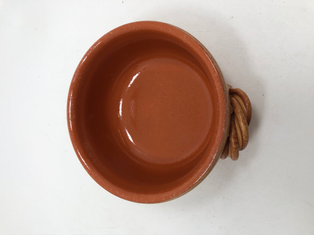BROWN GLAZED TERRACOTTA BOWL W/TWISTED HANDLES.