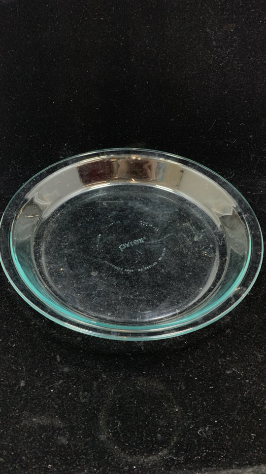 CLEAR GLASS PYREX PIE DISH.