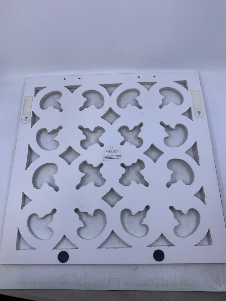 SQUARE WHITE WOOD CUTOUT WALL HANGING.
