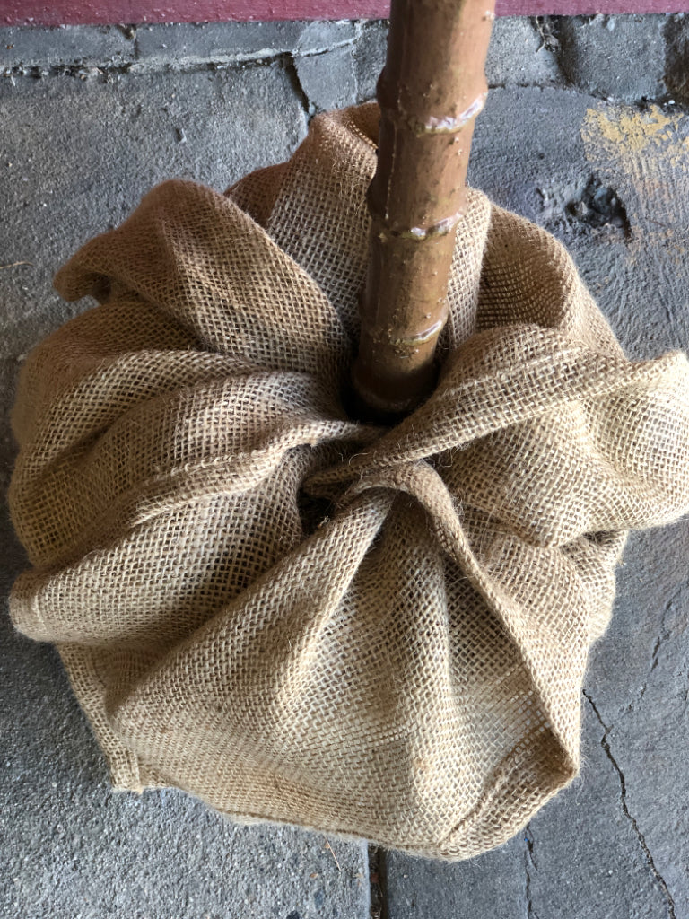 FAUX TREE IN BURLAP PLANTER.