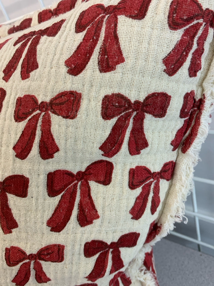 RED BOW PILLOW.