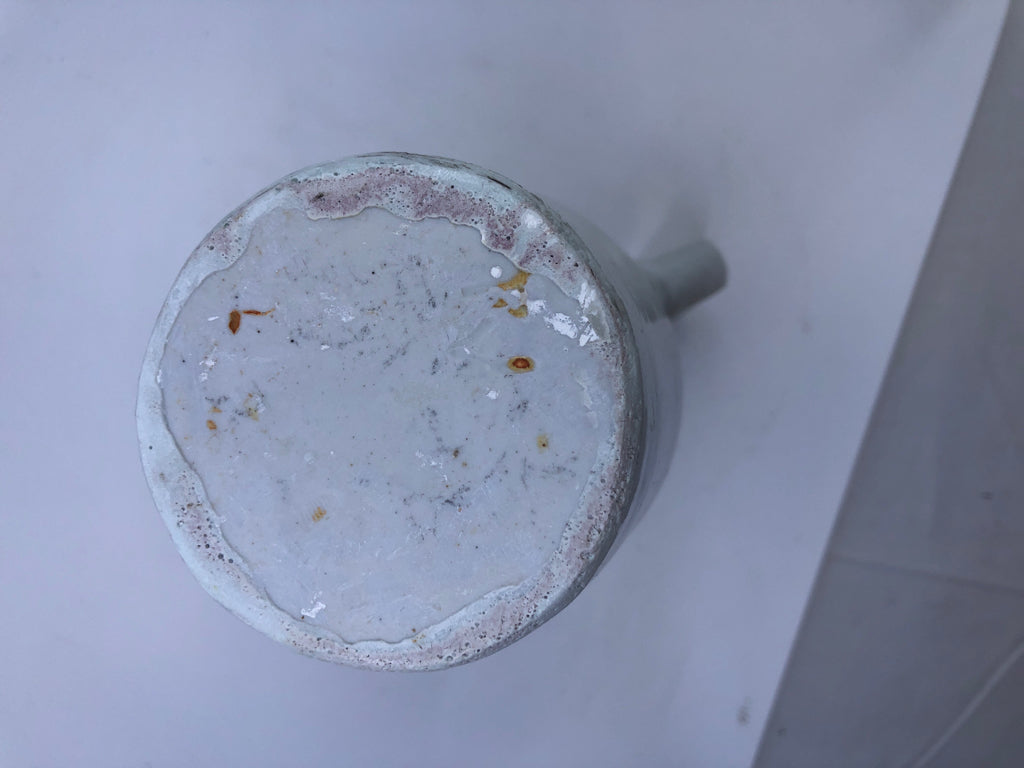 CREAM POTTERY PITCHER.