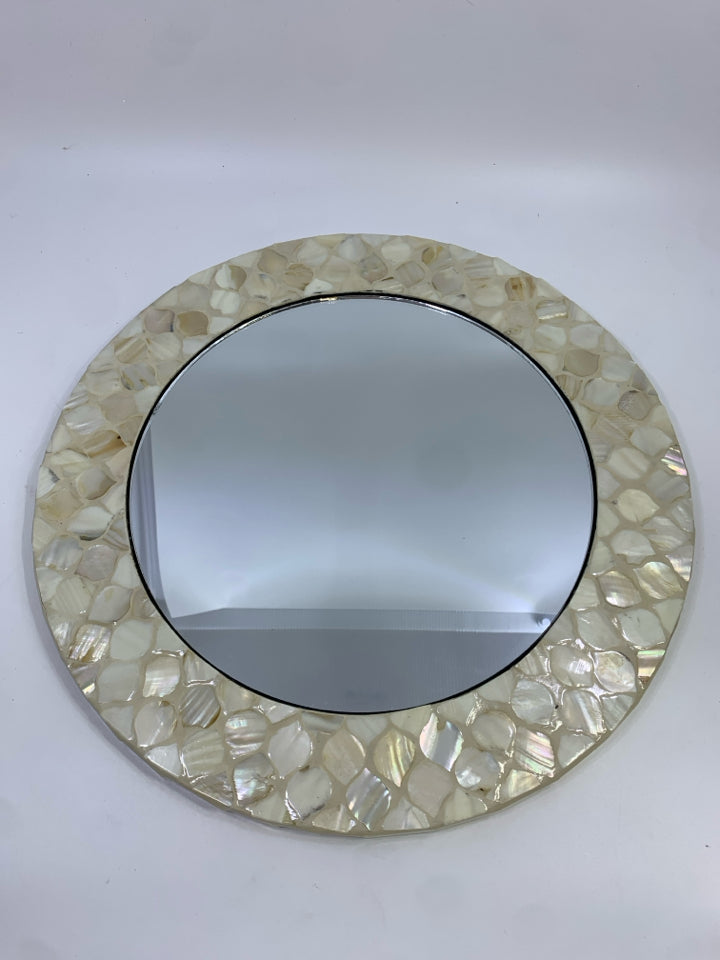 ROUND PEARLESCENT MIRROR.