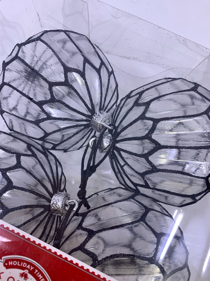 NIP 4 CLEAR PLASTIC BLACK GLITTER ORNAMENTS.