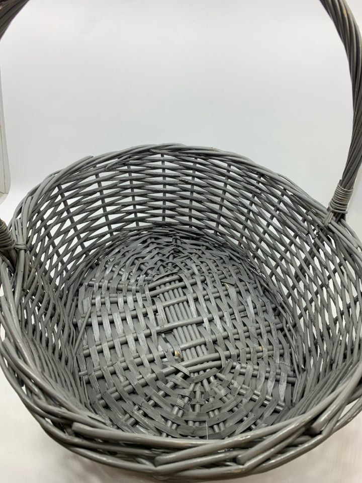 LG GREY WICKER BASKET.