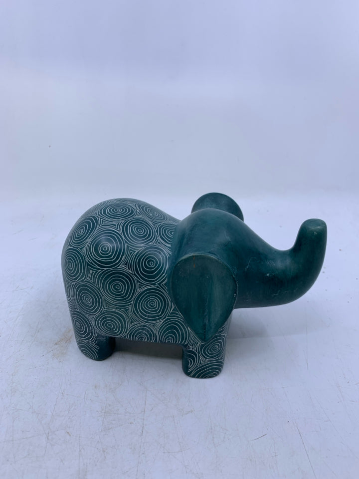 HEAVY ELEPHANT W/ WHITE CIRCLES.