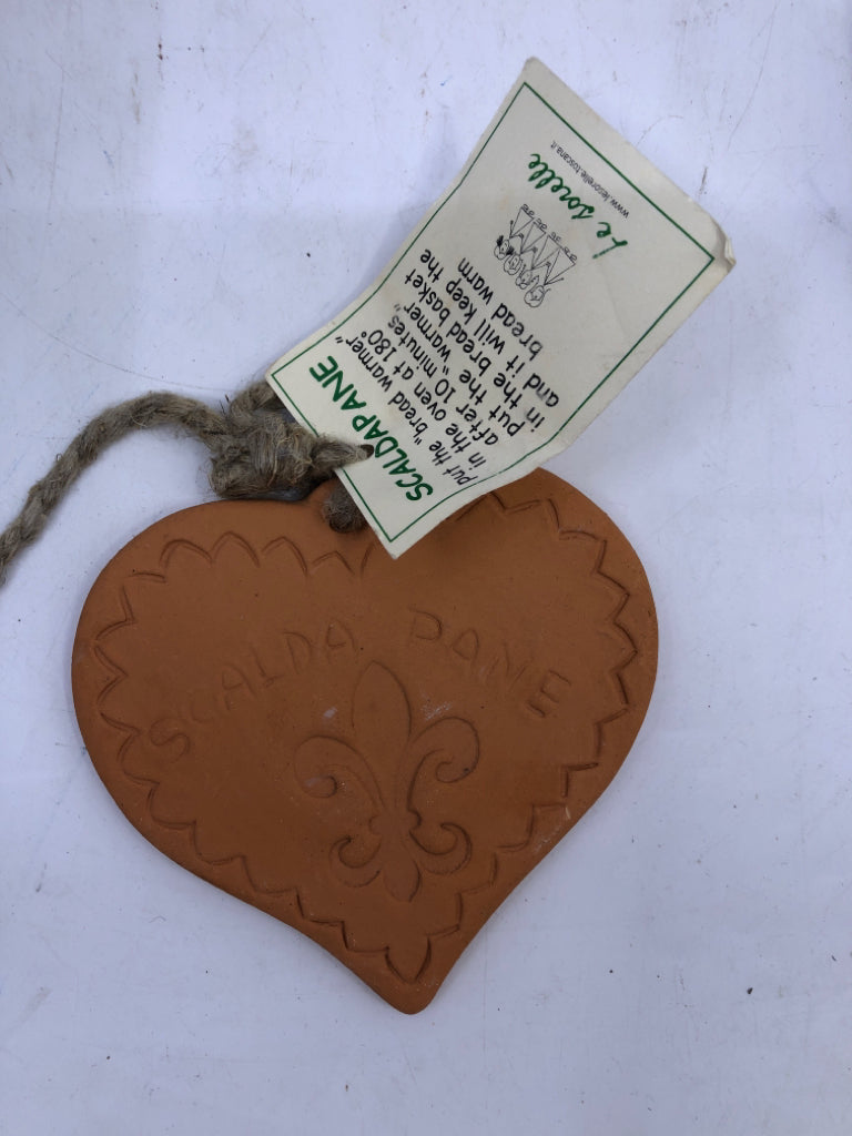 NWT HEART SHAPED TERRACOTTA BREAD BASKET WARMER.