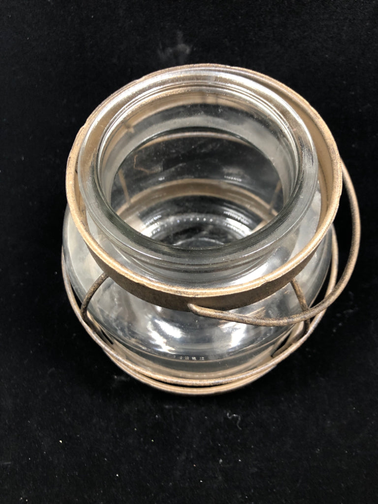 METAL WRAPPED GLASS CANDLE LANTERN.