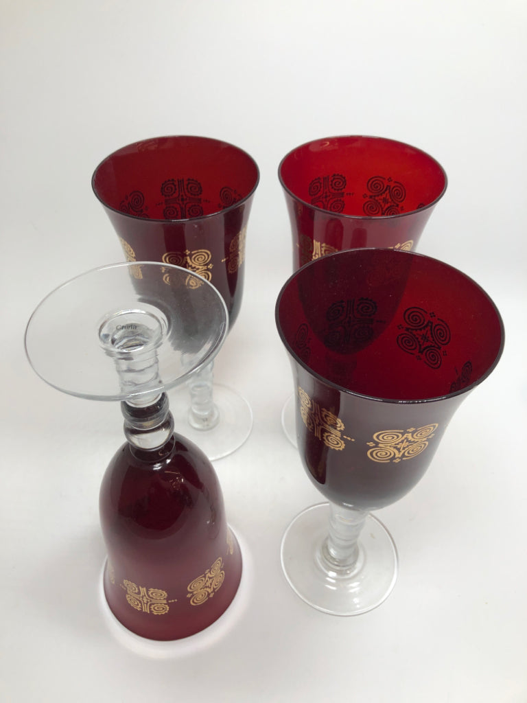 4 RUBY RED GOBLET WITH GOLD SWIRL DESIGN.