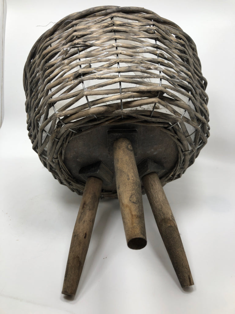 GRAY DISTRESSED RAISED WICKER PLANTER.