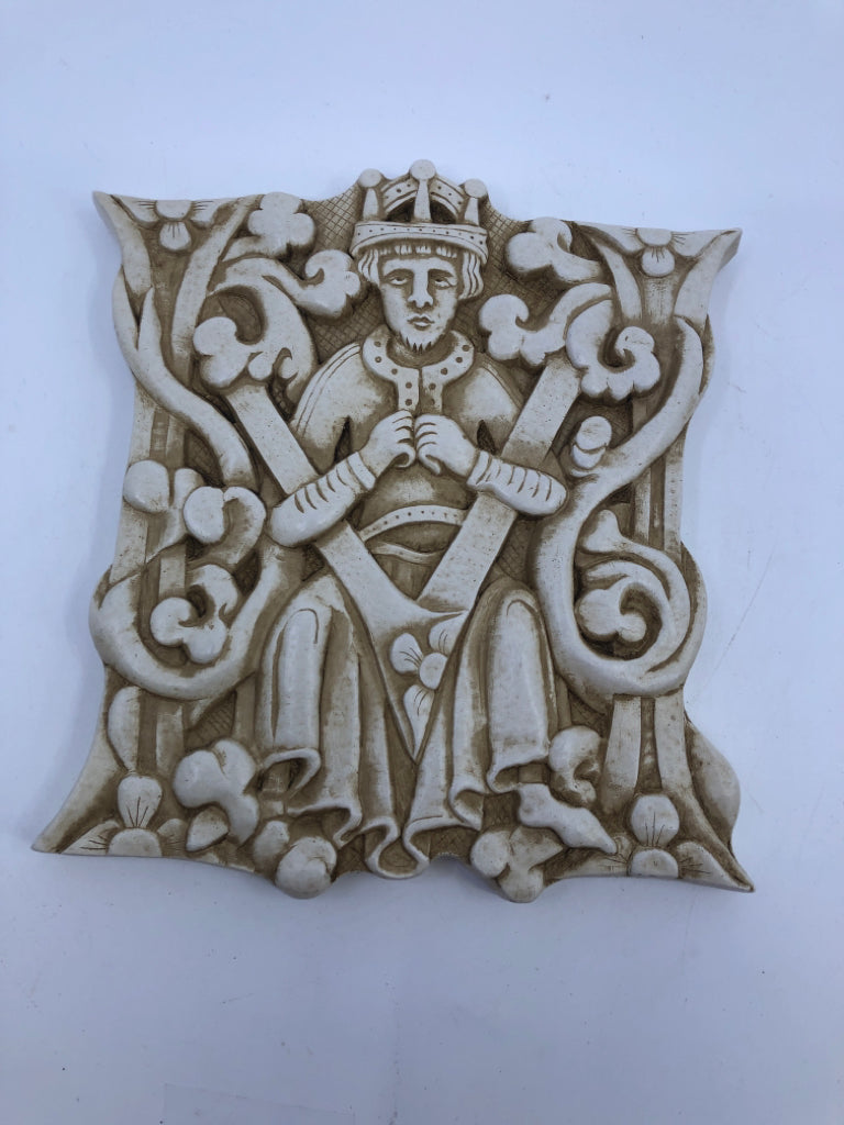 CERAMIC EMBOSSED KING IN CHAIR FLOWERS FACSIMILIES WALL HANGING.