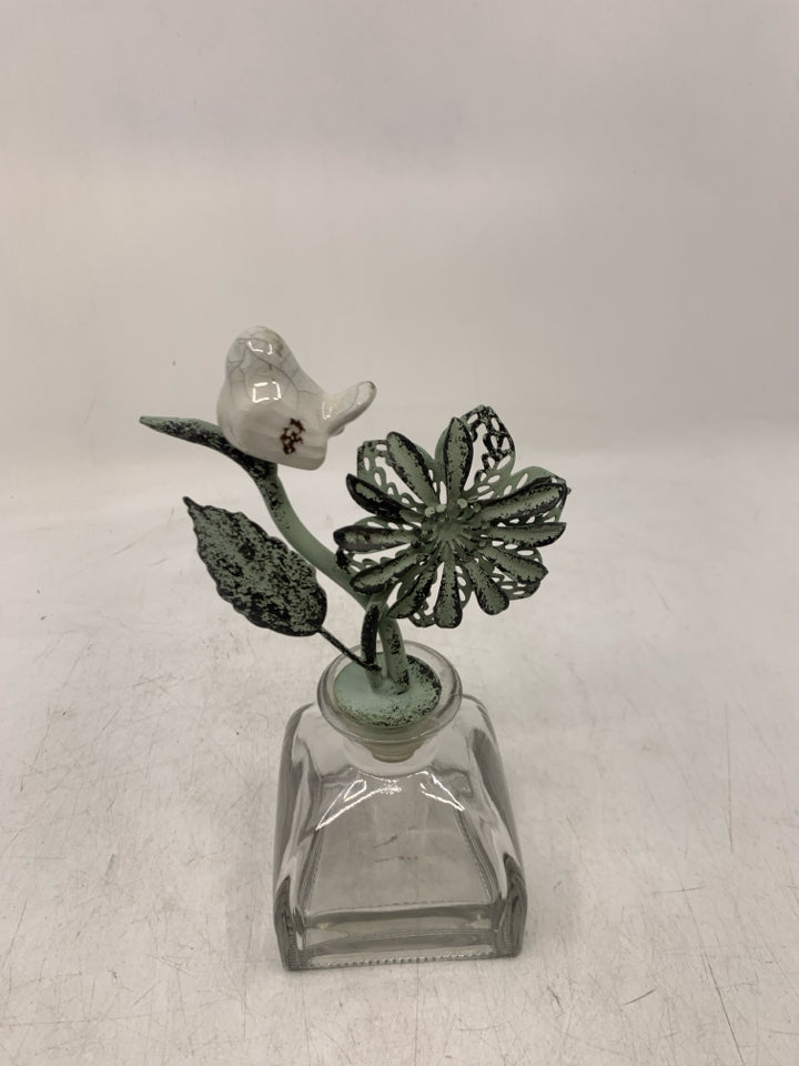 CLEAR GLASS BOTTOM W/ METAL BRANCH W/ BIRD.