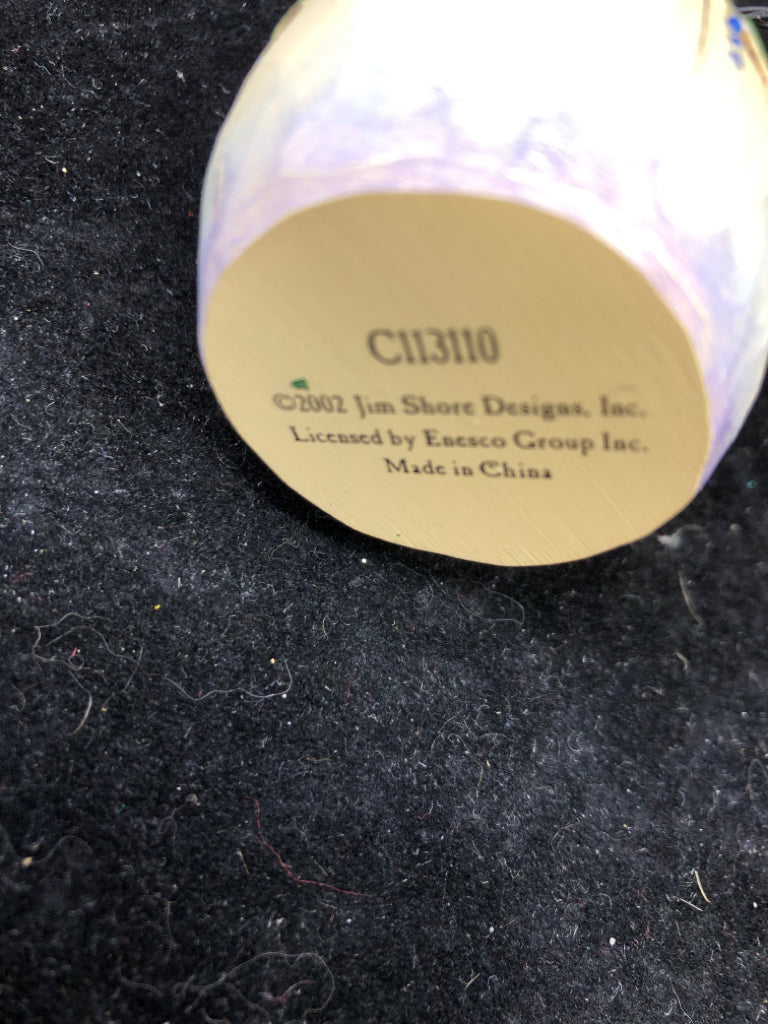 JIM SHORE HOLDING FLOWERS SNOW WOMAN.