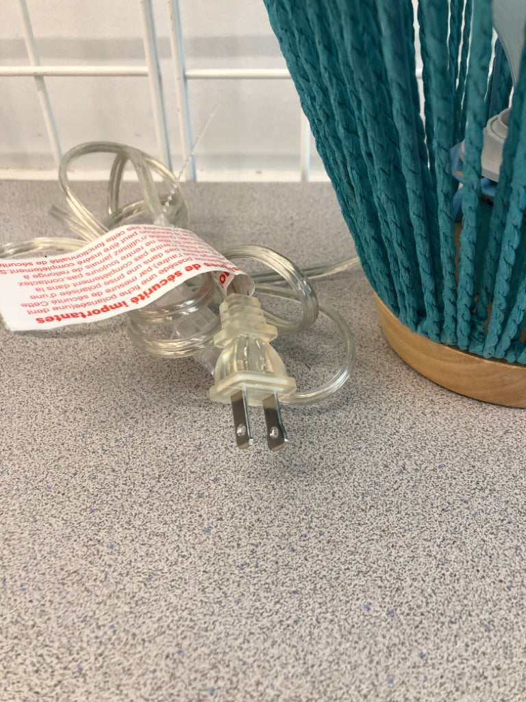 BLUE WOVEN LANTERN-STYLE LAMP.