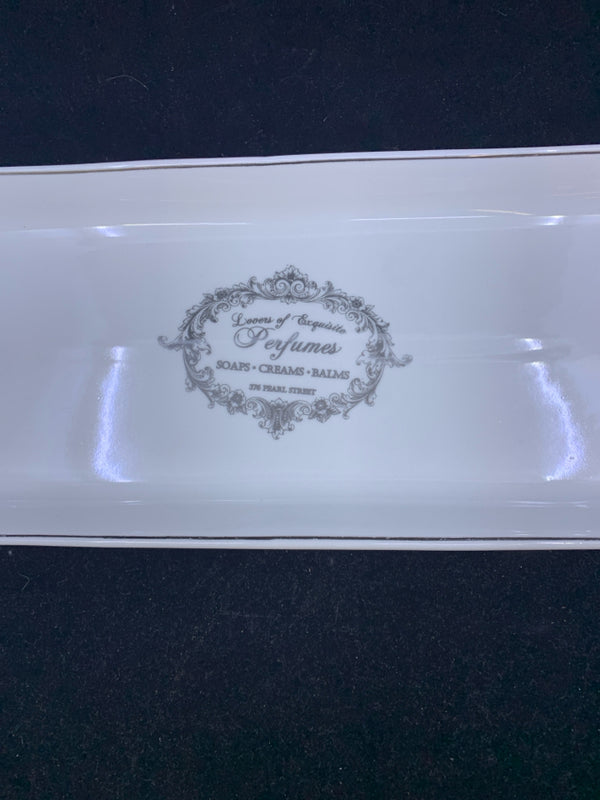 WHITE OVAL TRAY W/ "PERFUMES" IN MIDDLE SILVER RIM.