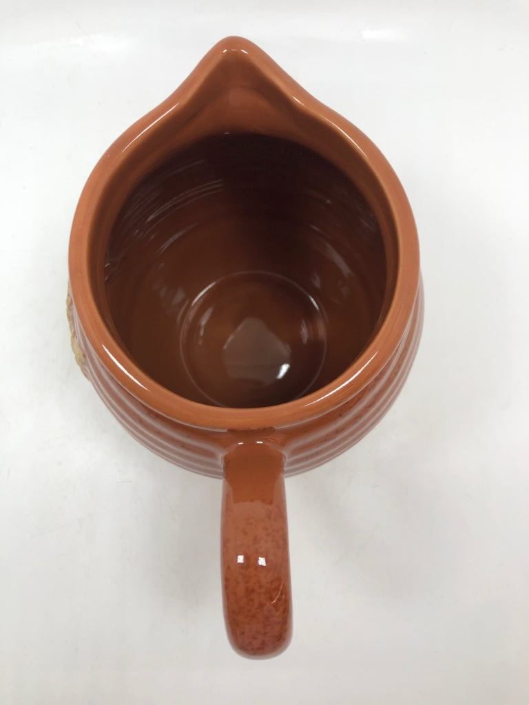 LEAF EMBOSSED BROWN GLAZED PITCHER.