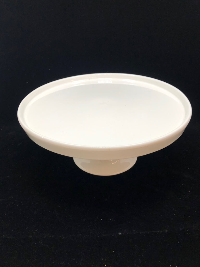 WHITE CERAMIC RAISED CAKE STAND.