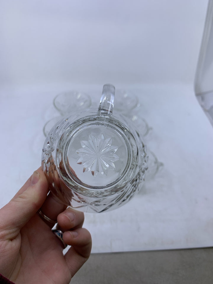 6 SHORT GLASS CUPS W/ STAR PATTERN.