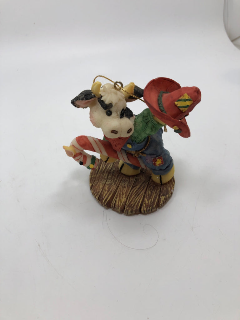 CHRISTMAS COWBOY COW ORNAMENT.