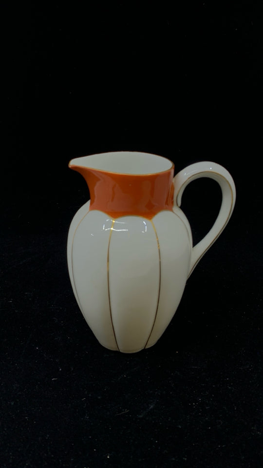 VTG GOLD RIBBED ORANGE SPOUT PORCELAIN PITCHER.