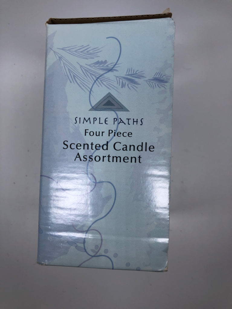 NIB 4PC CANDLE SET.