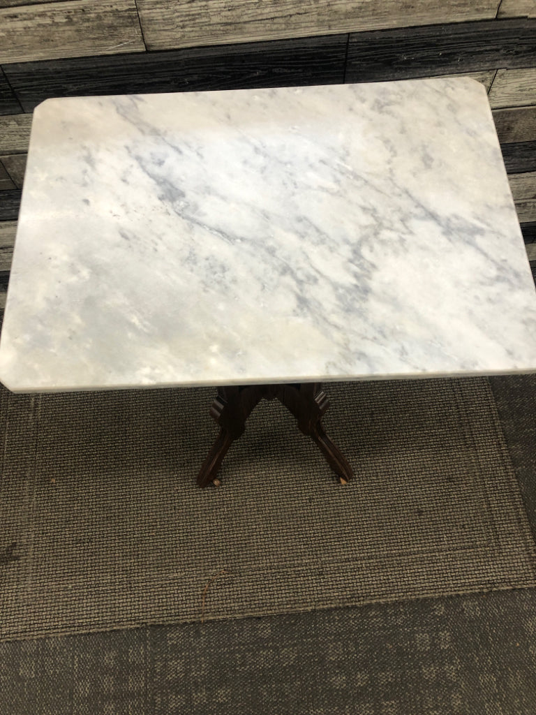 VTG MARBLE TOP VICTORIAN STYLE WALNUT END TABLE ON WHEELS.