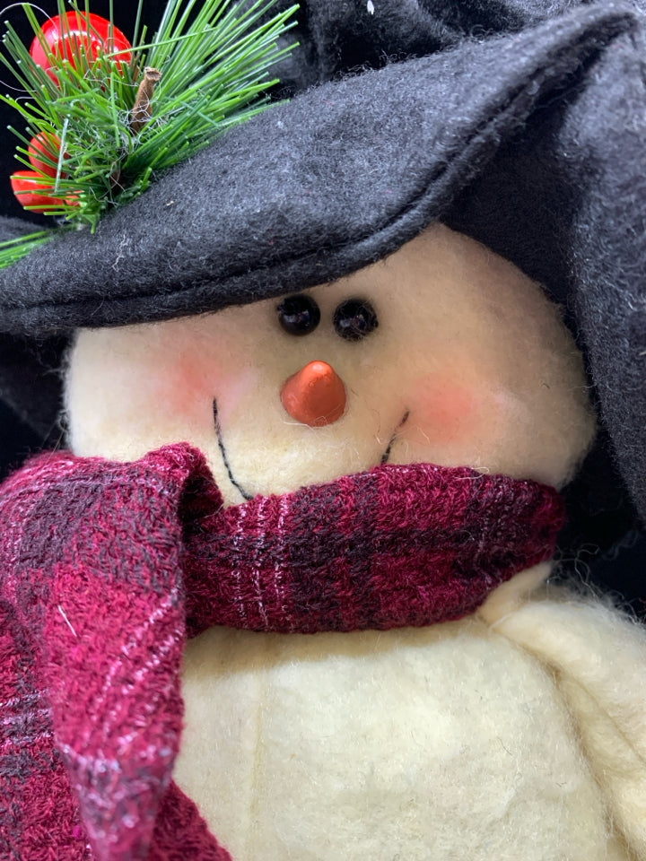 PLUSH STANDING SNOWMAN IN BLACK HAT.