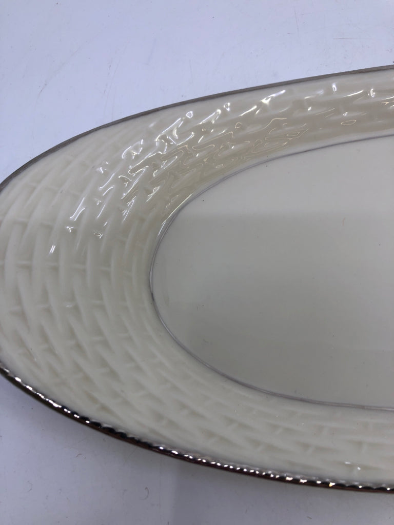 OVAL BASKET WEAVE DISH W/ SILVER EDGE.