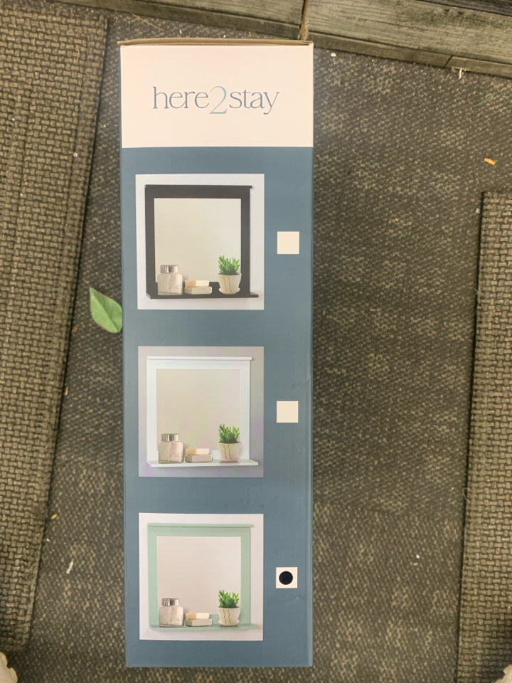 NIB WALL SHELF WITH MIRROR.