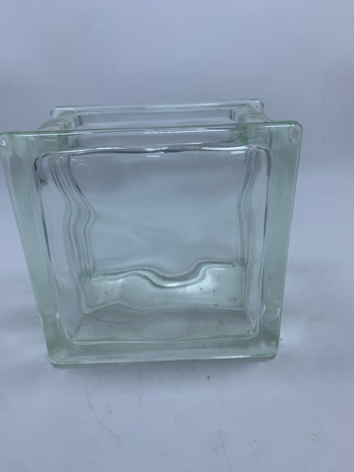 SQ CLEAR GLASS BLOCK VASE W/WAVY DESIGN.
