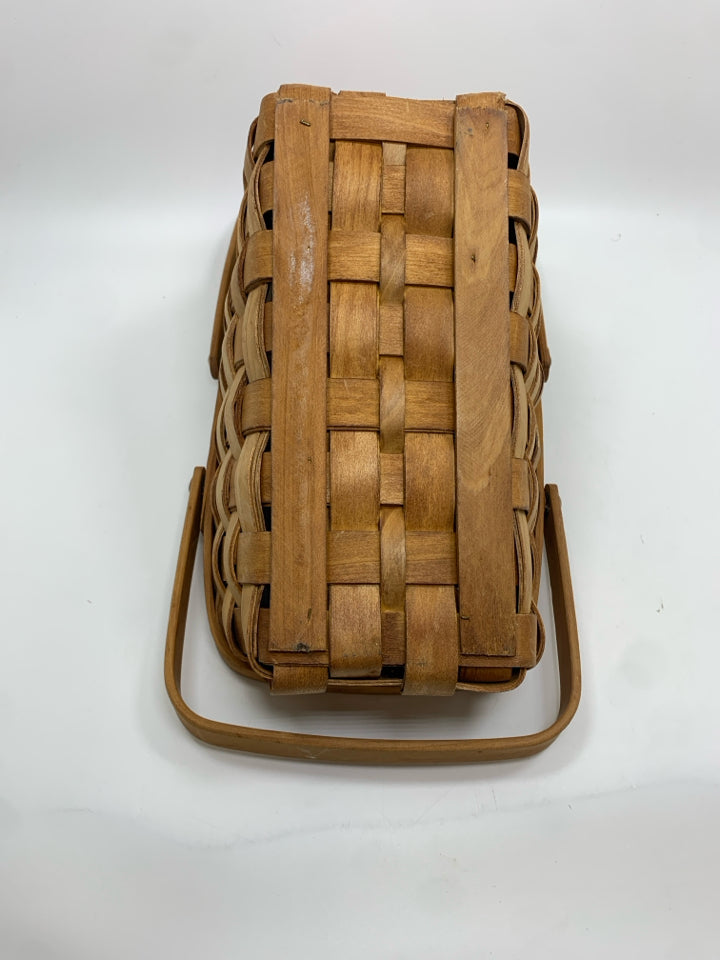 SLANTED WICKER BASKET W/HANDLES.