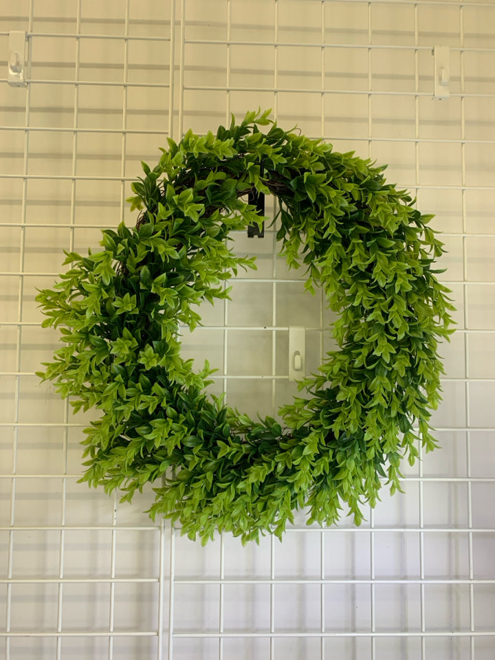 FAUX GREENERY WREATH W/TWIG BASE.