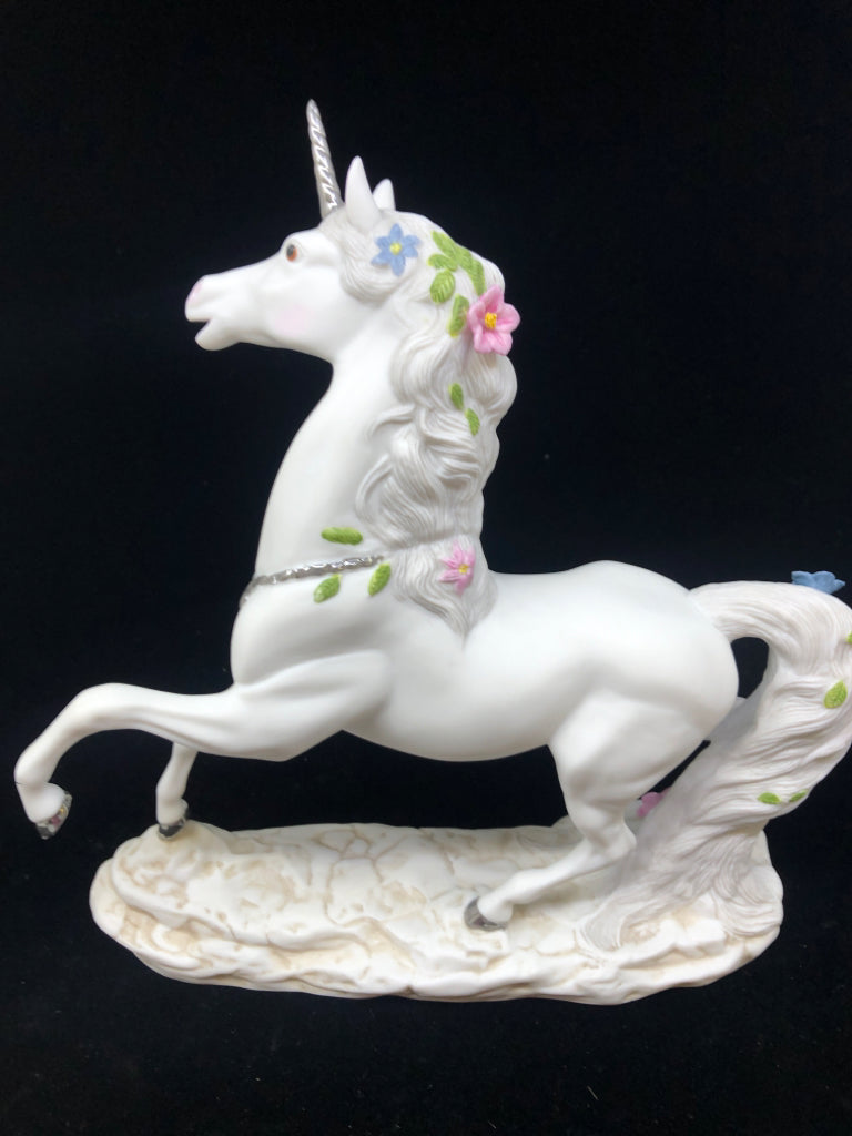 CERAMIC UNICORN W PINK AND BLUE FLOWERS.