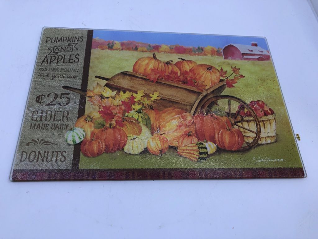 GLASS PUMPKIN CUTTING BOARD.